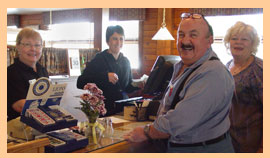 cashier and hostess working